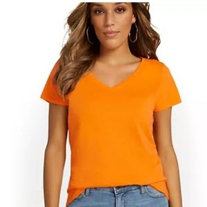 NWT Woman's V-neck Perfect Tee. Perfect for any day of the week, relaxed fit.$10